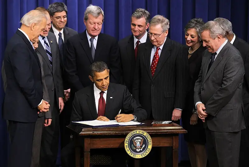 A bill signing in December 2010.