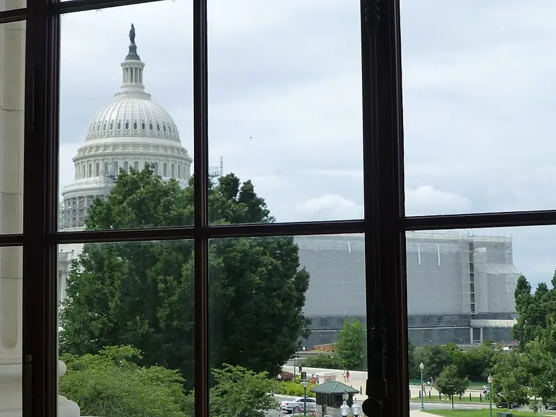The Capitol, seen through a window.